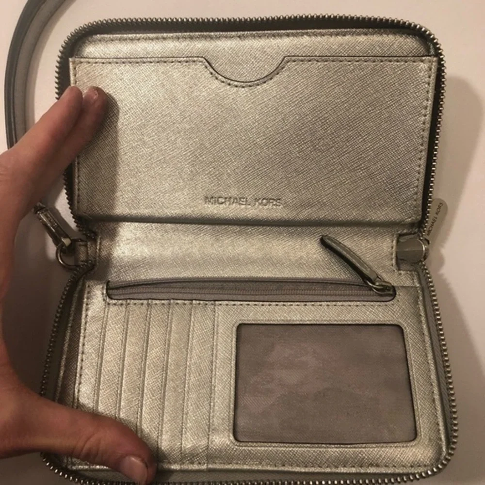 Michael kors silver wristlet wallet clutch